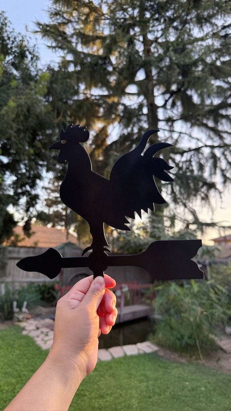A steel rooster silhouette.