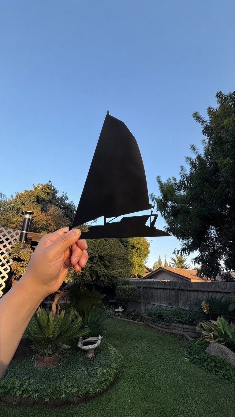 A steel sailboat silhouette.